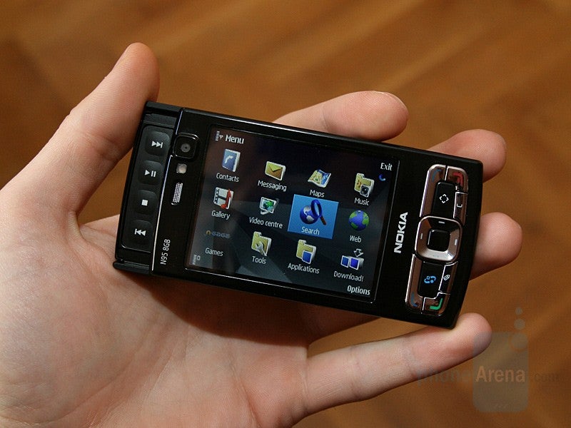 Nokia N95 8GB with its iconic slider up, showing multimedia controls in landscape mode, probably using auto screen rotation way before the devices of our time